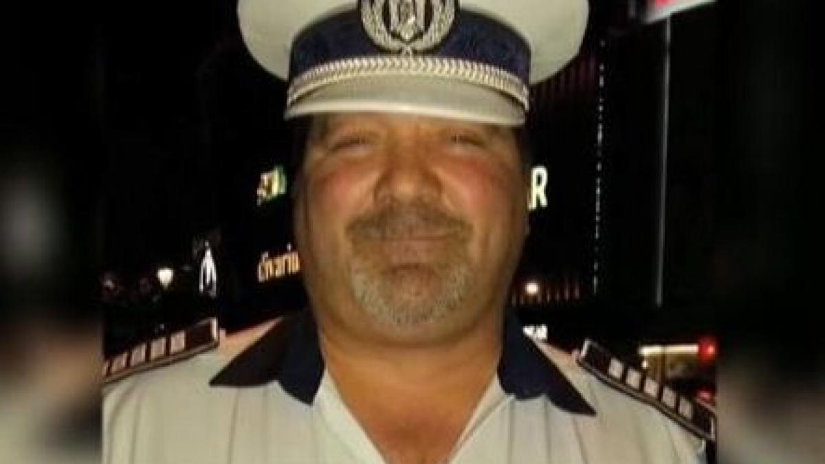 politistul erou condus pe ultimul drum aproape 1 000 de oameni au participat la inmormantare