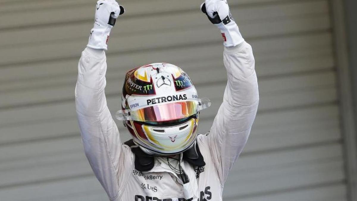 lewis hamilton castiga marele premiu al japoniei