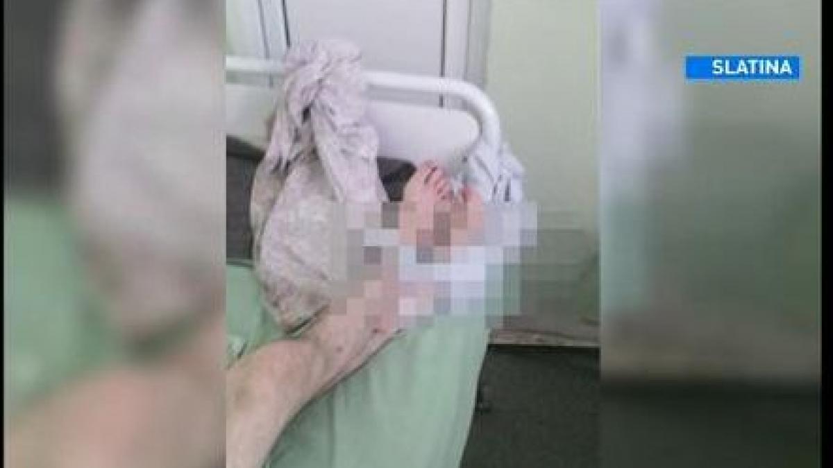pacient legat de pat in spitalul din slatina