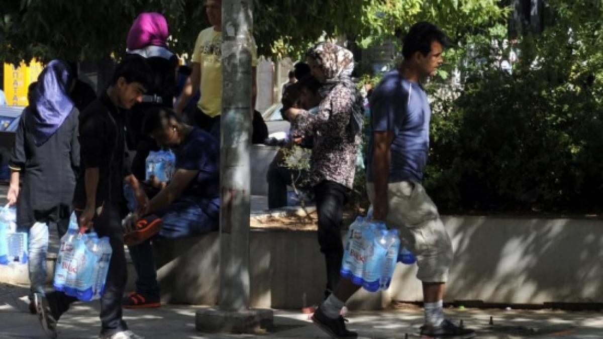 refugiati sirieni criminali de razboi assad