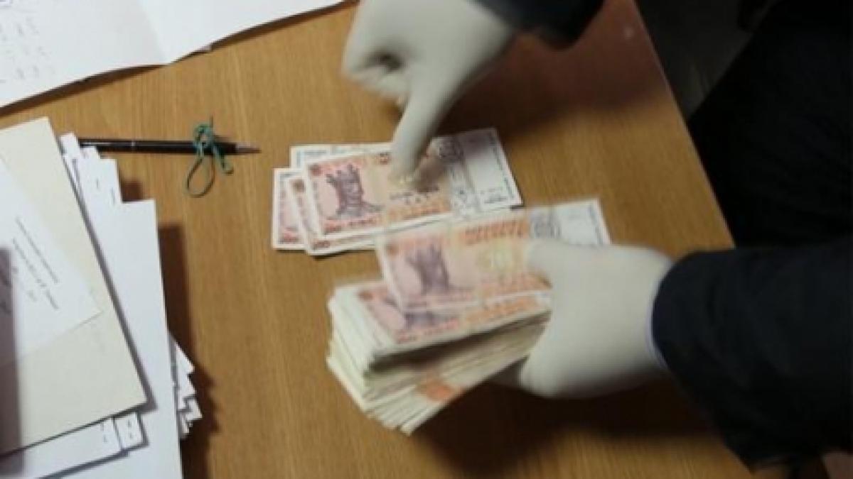 trei politisti au fost arestati pentru trafic de influenta mita de peste 600 000 lei