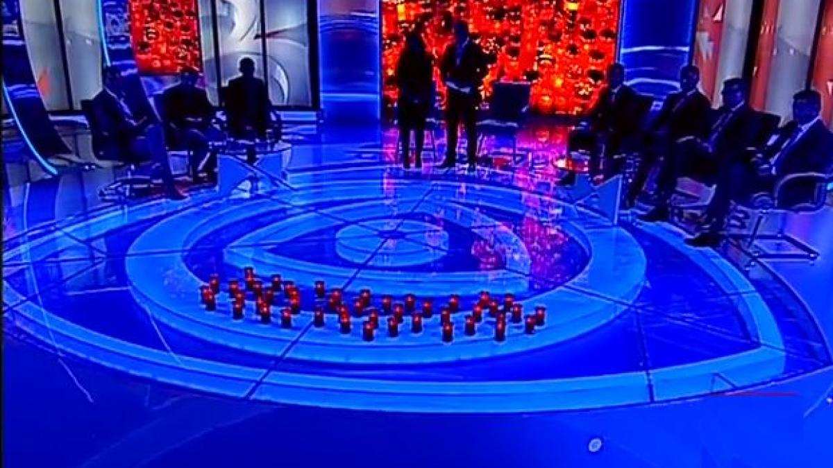 o candela aprinsa pentru victimele de la colectiv