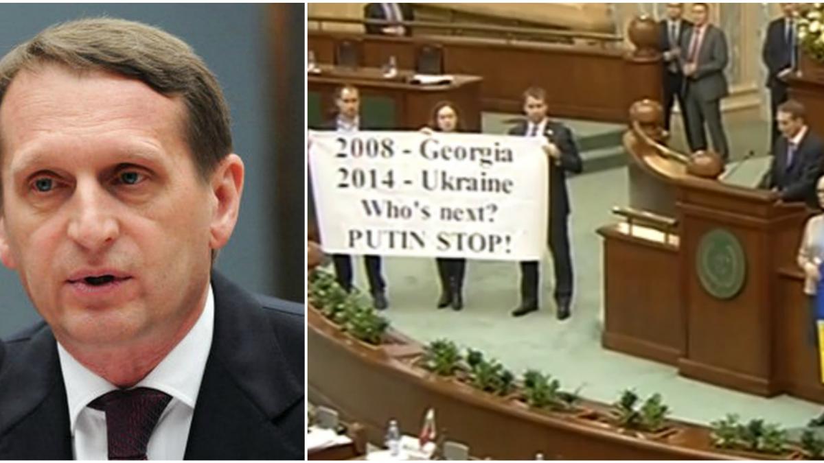 oficial rus interzis in ue primit in senatul romaniei protest cu bannere si mesaje pentru putin