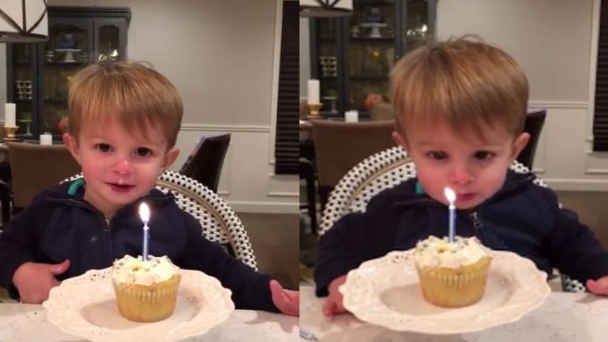 efortul acestui baietel trebuie rasplatit priveste cat de haios este cand sufla in lumanare