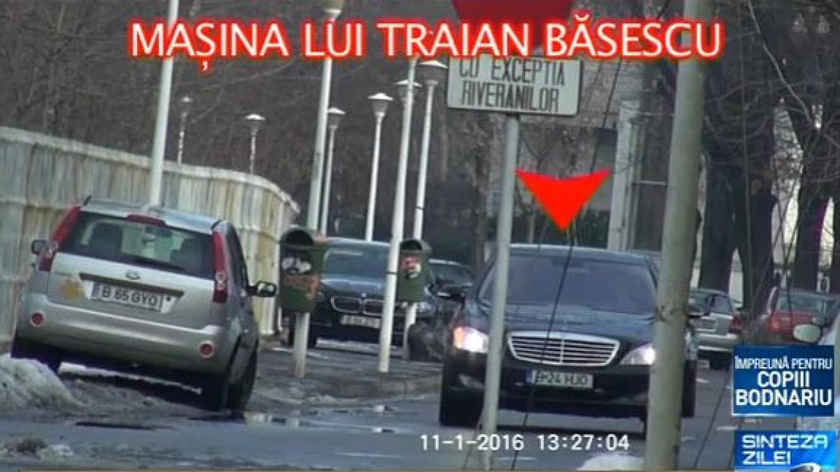 traian basescu surprins in trafic in drumul sau spre elena udrea