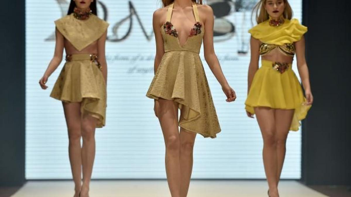 de ce nu zambesc modelele pe podium