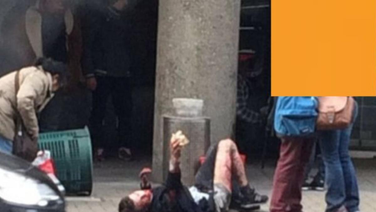 fotografia care te va emotiona ce au facut doi supravietuitori ai atentatelor din bruxelles