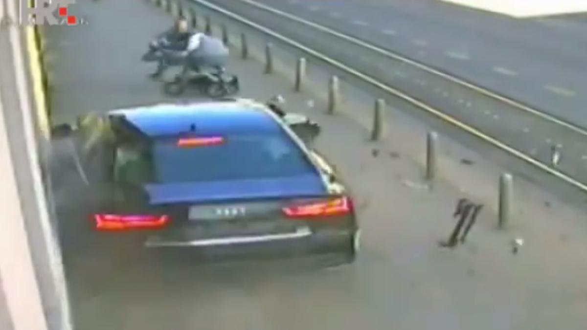 un bolid scapat de sub control de un sofer beat se indreapta spre un barbat si fiul sau de 3 luni