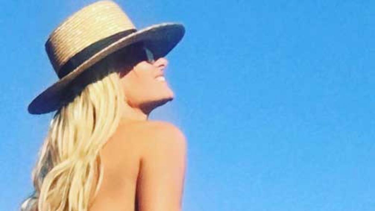 imginea care face cat 1 000 de cuvinte cum arata delia in costum de baie