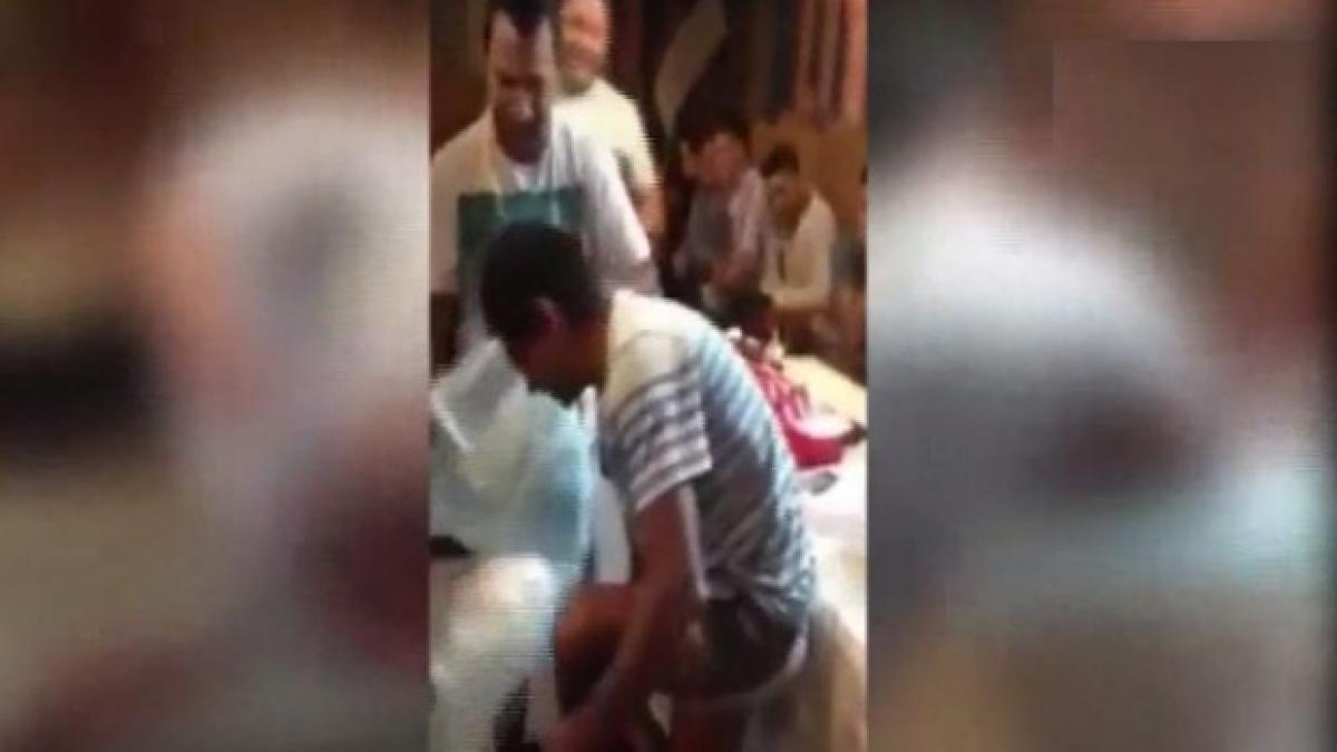 imagini scandalos biserica botez depravare