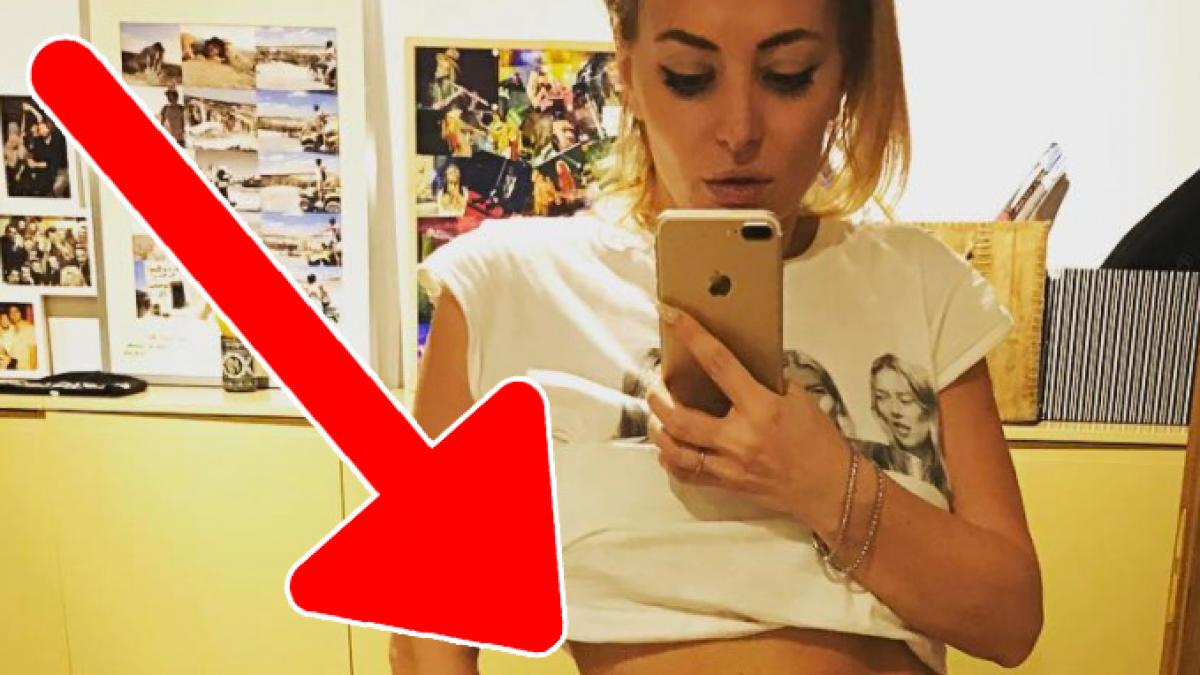 delia le a aratat tuturor asta si a ridicat tricoul si artista le a inchis gura fanilor