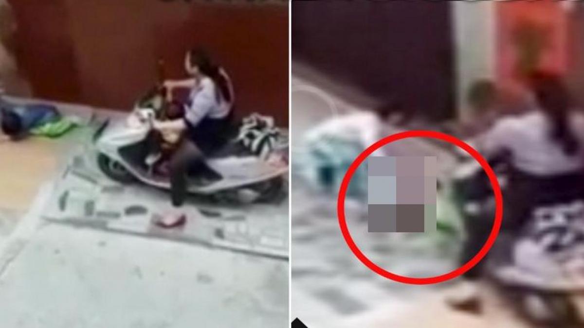 imagini socante o femeie aflata pe scuter loveste intentionat un copil cazut la pamant