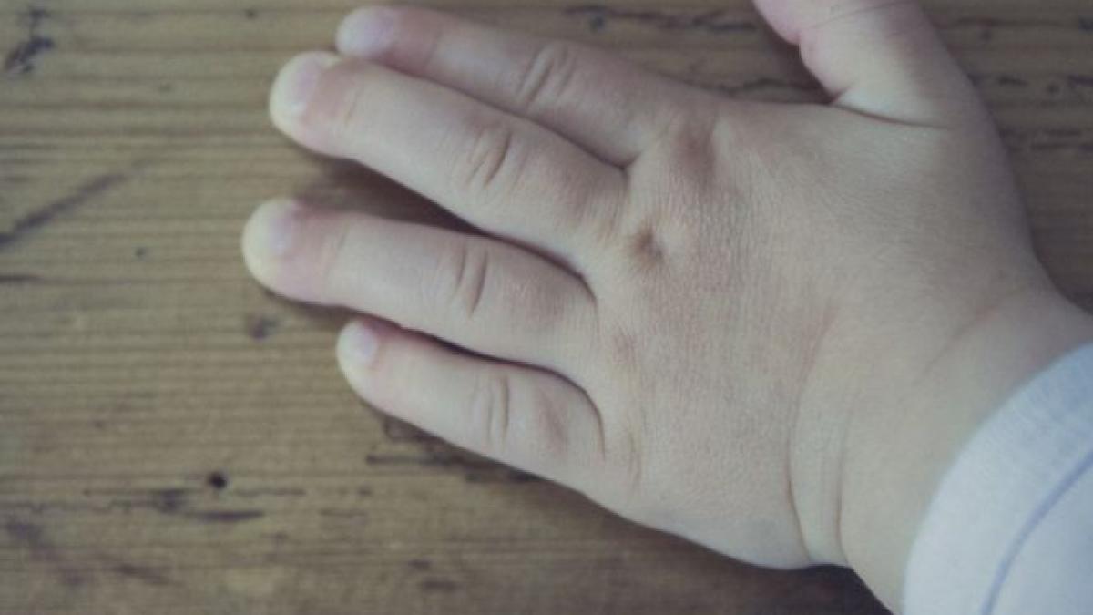 o femeie si a decapitat fiica de trei luni