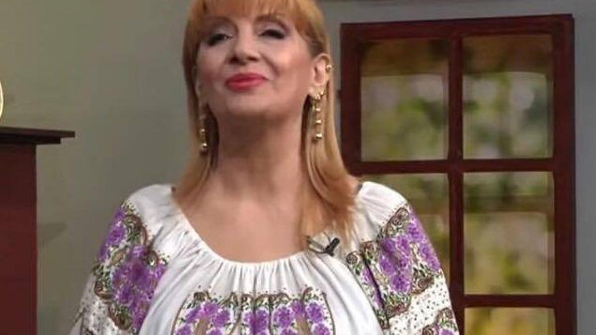 motivul pentru care ileana ciuculete a fost inmormantata imbracata in ia cu flori mov