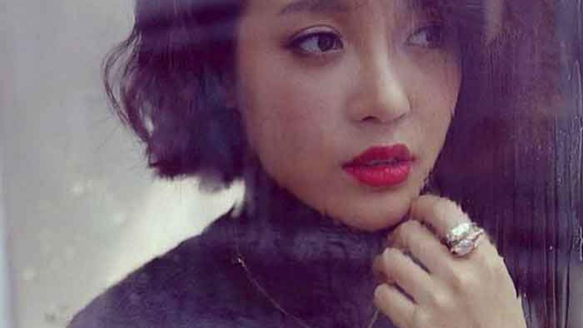 realitatea din spatele acestei poze cum a ajuns sa fie fotografiata asa bruneta din imagine