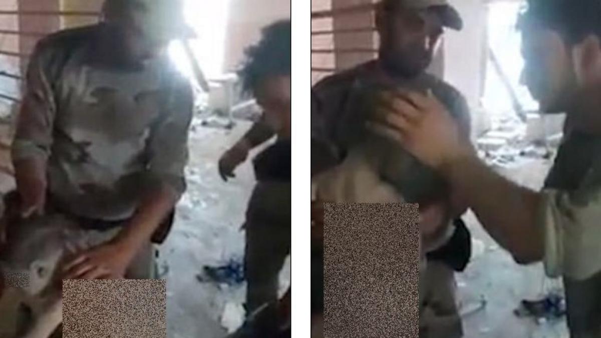 treceau pe langa o scoala bombardata in razboiul cu isis cand au auzit plansetul unui copil