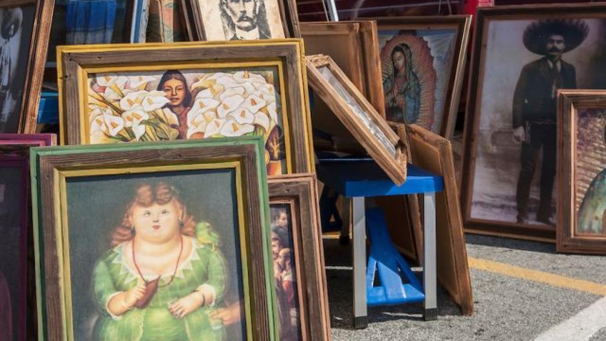 a cumparat de la un targ de vechituri un tablou cand a ajuns acasa si l a desfacut a avut parte de