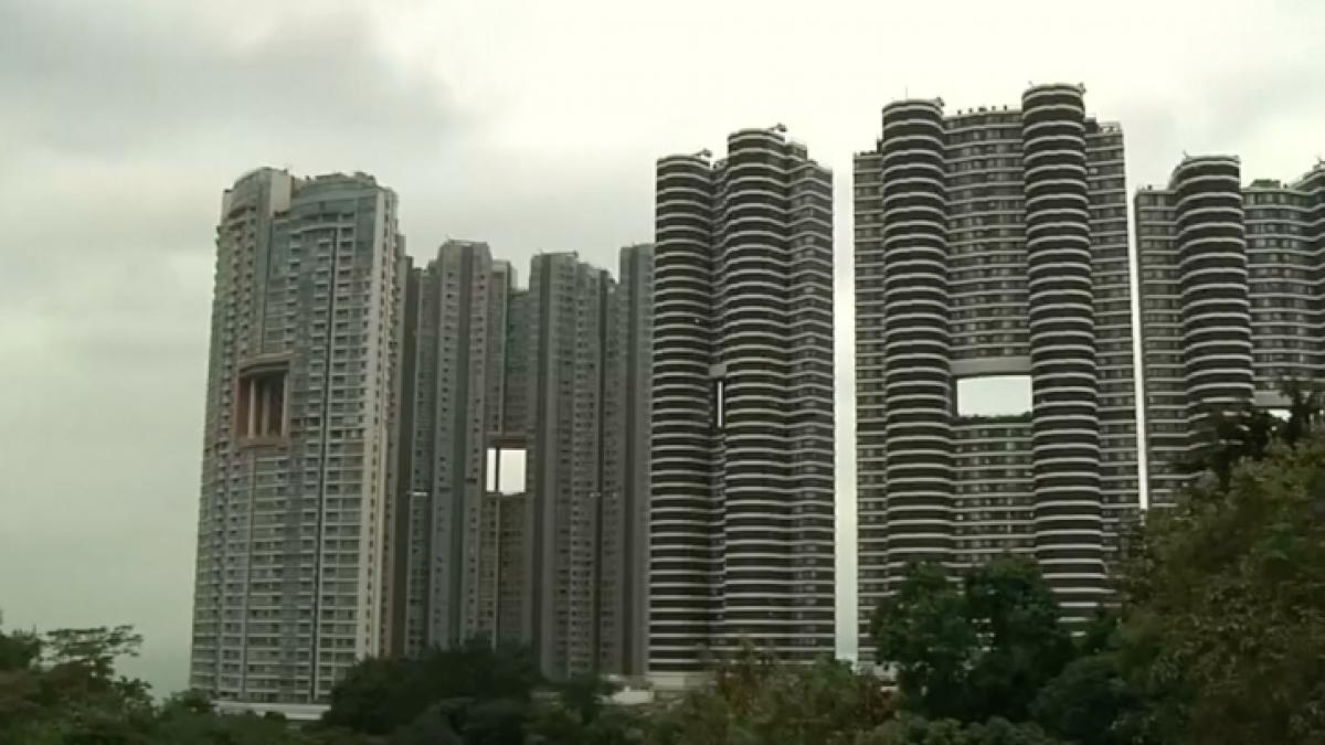 motivul incredibil pentru care cladirile din hong kong au gauri imense prin ele