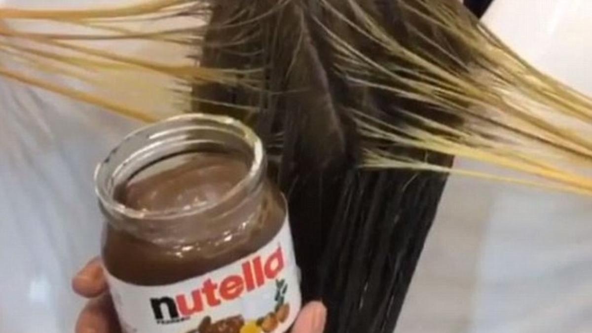 Experiment bizar la un coafor din Dubai. O tânără și-a vopsit părul cu Nutella, iar rezultatul e unul spectaculos (VIDEO)
