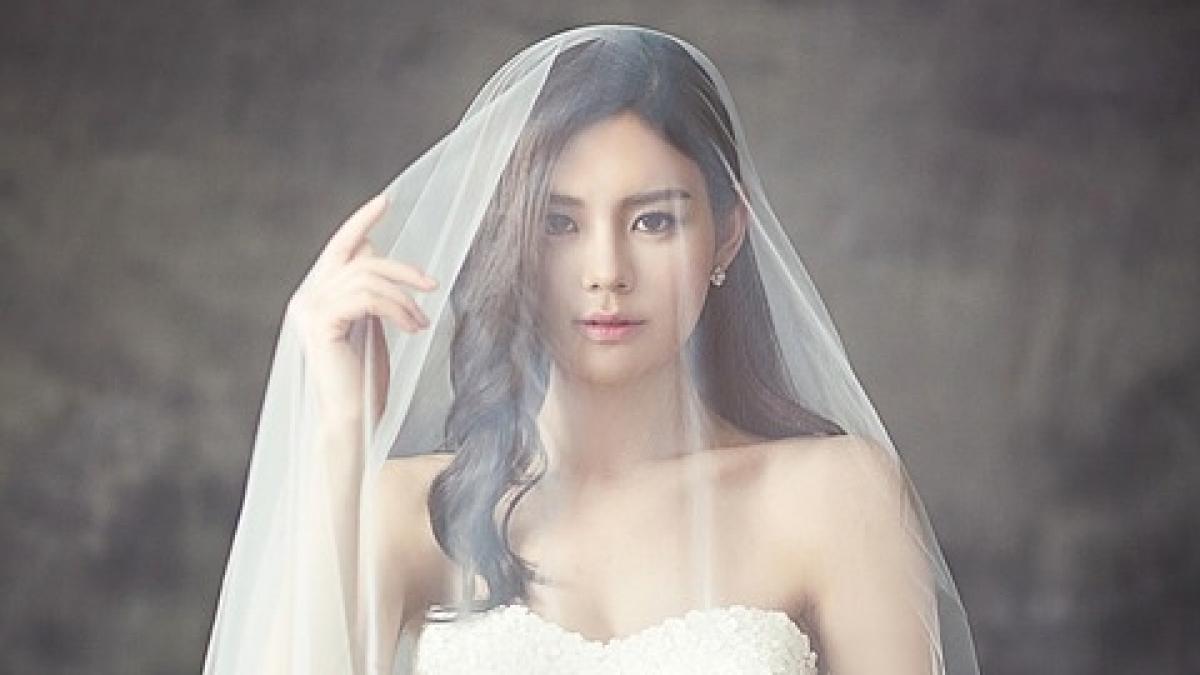 motivul pentru care miresele poarta voal