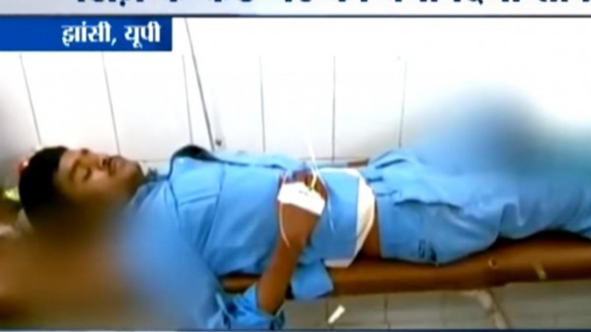 scene de groaza intr un spital un barbat sta intins cu piciorul amputat pe post de perna