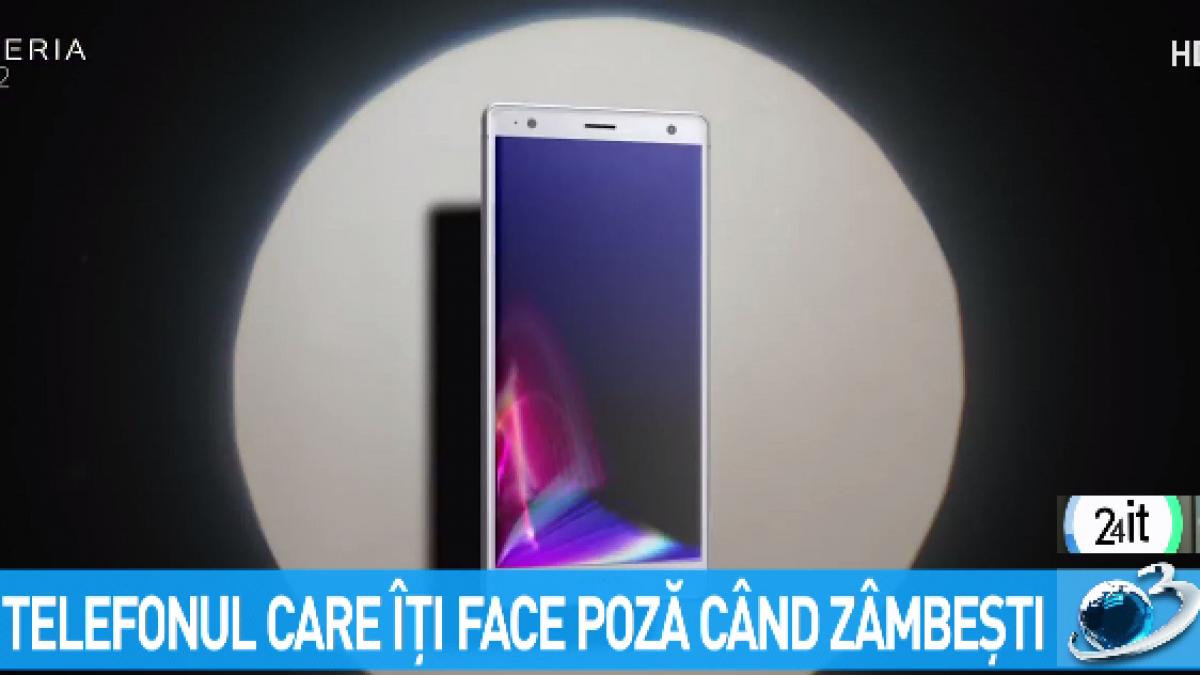 24 it telefonul care iti face poza cand zambesti