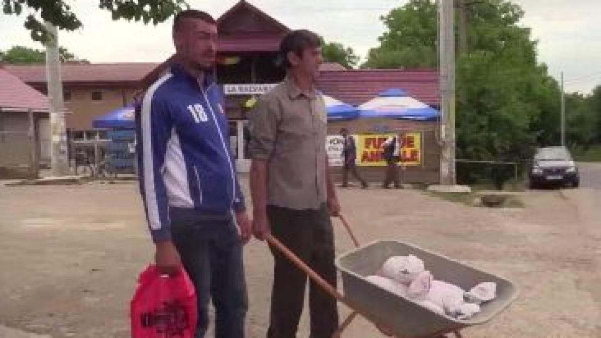 razbunarea unui iesean aflat in conflict cu cei de la primarie si a platit amenda cu o roaba de