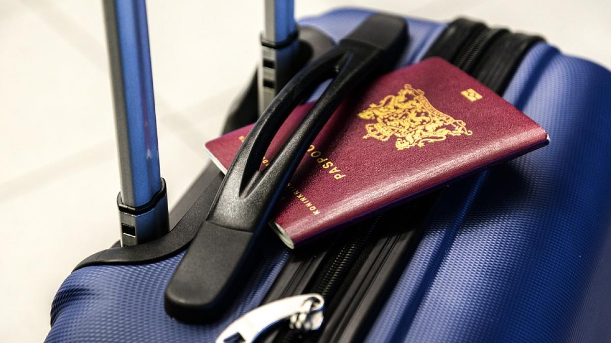 zambitul in pozele de pasaport poate impiedica furtul de identitate