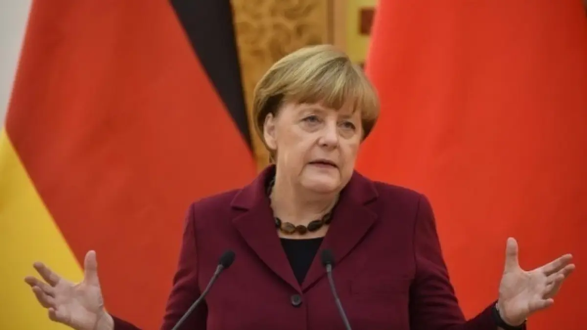 reactia lui merkel atunci cand o femeie a incurcat o cu sotia lui emmanuel macron