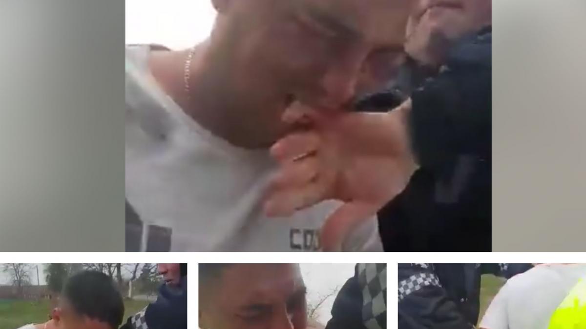 imagini cu un barbat care musca un politist de deget si nu ii da drumul in timp ce era retinut video