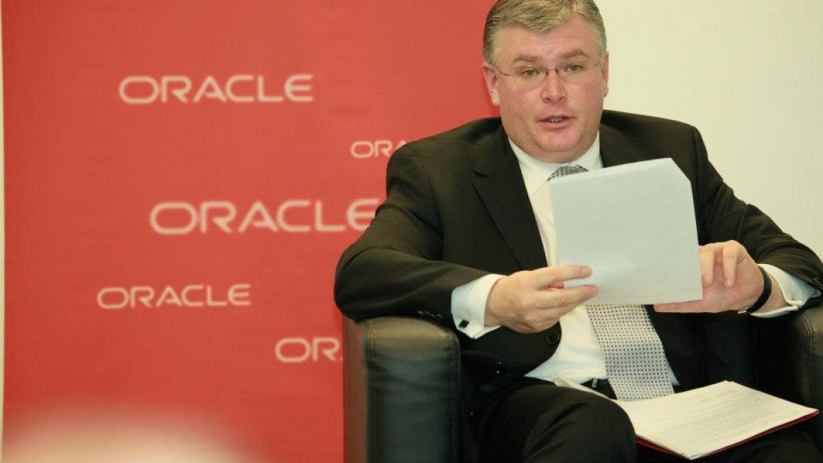 directorul oracle romania acuzat ca a luat mita sorin mindrutescu si a platit cautiune de 500 de