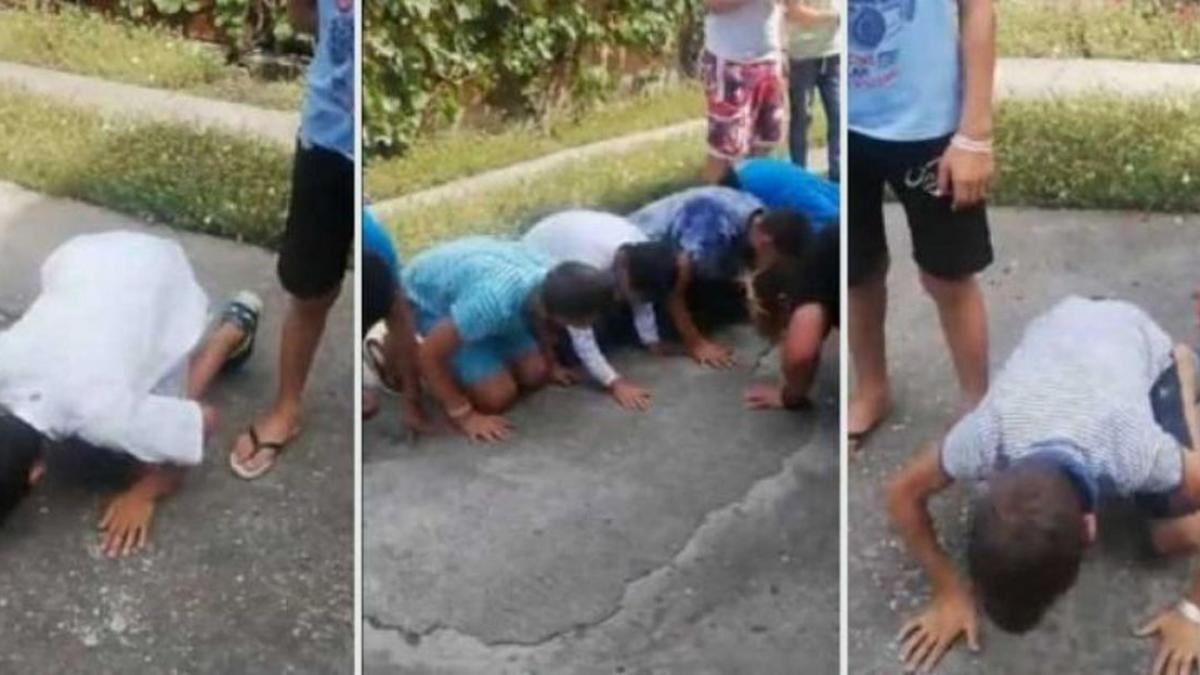 imagini revoltatoare copii pusi sa faca matanii pe asfalt pentru ca nu au atenti la slujba va