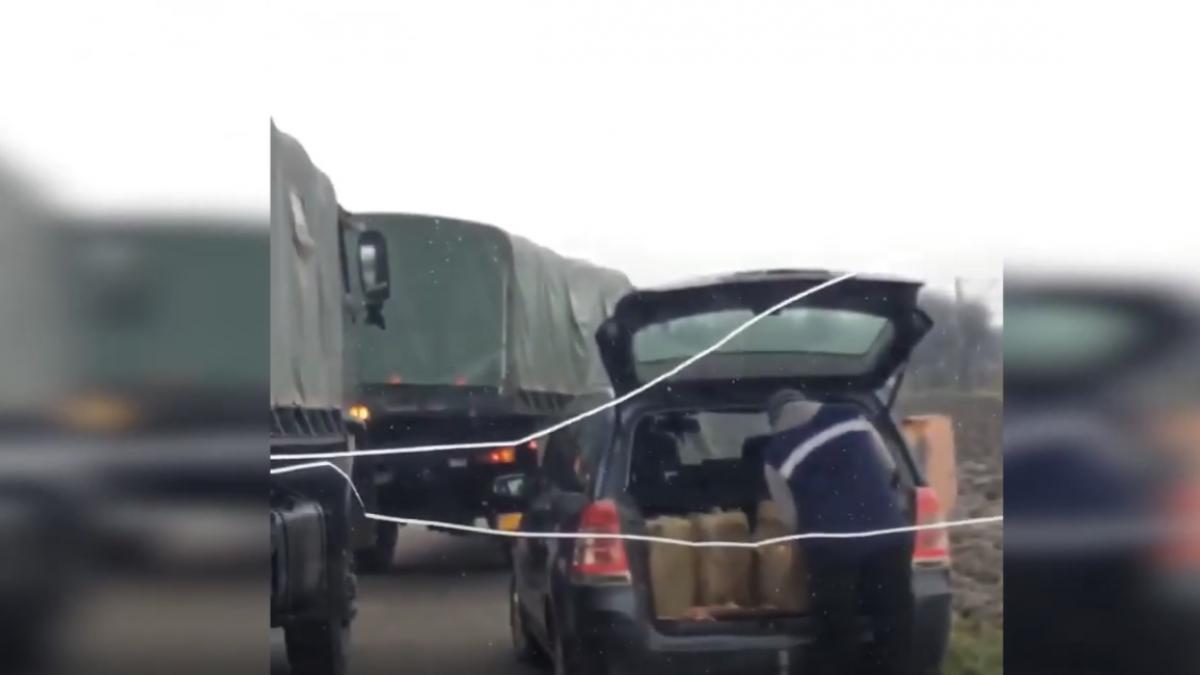 militari filmati cand vindeau motorina din camioanele armatei video