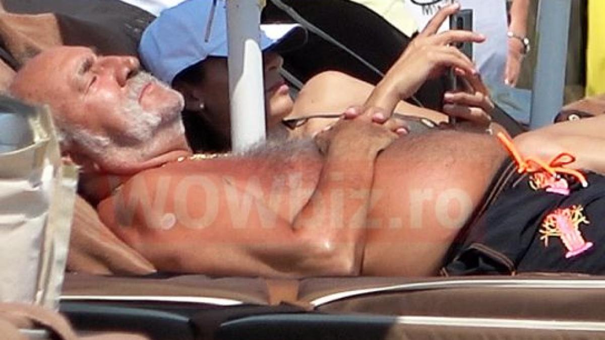 ion tiriac plaja mamaia miliardar relaxat sezlong tanara