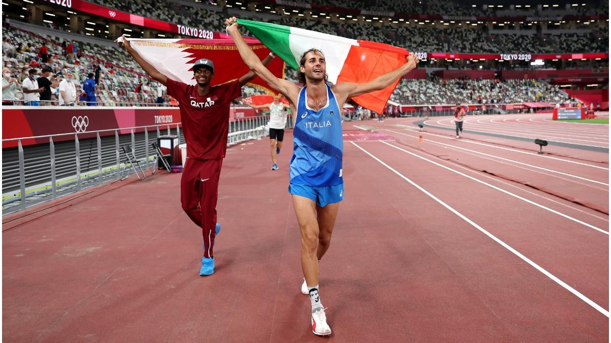 atleti impart medalia aur jocuri olimpice