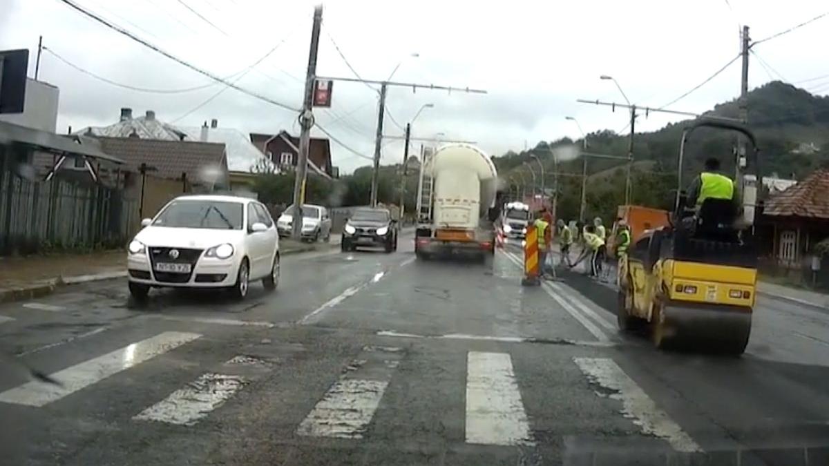 muncitori piatra neamt asfalt ploaie