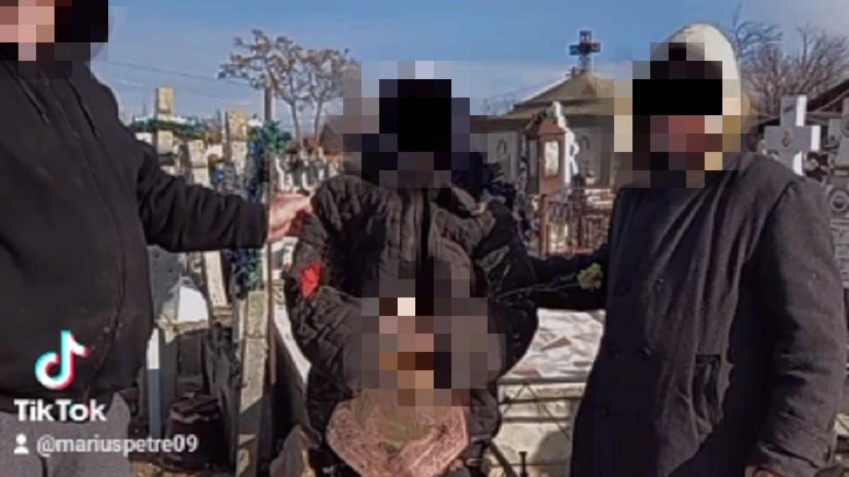 barbati danseaza manele cimitir ciorani cadavru femeie deshumata