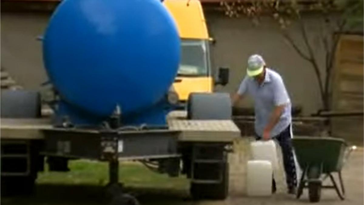 apa cu portia de la cisterna intr o comuna din iasi