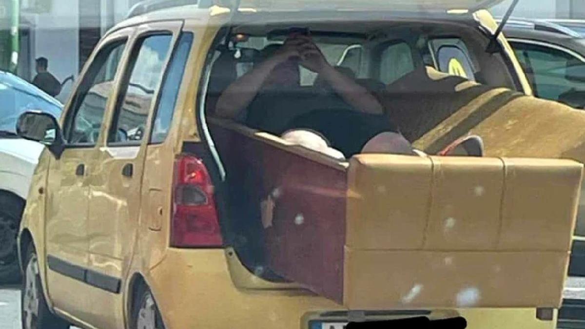 imagine virala barbat arad canapea portbagaj plimbat pe ea