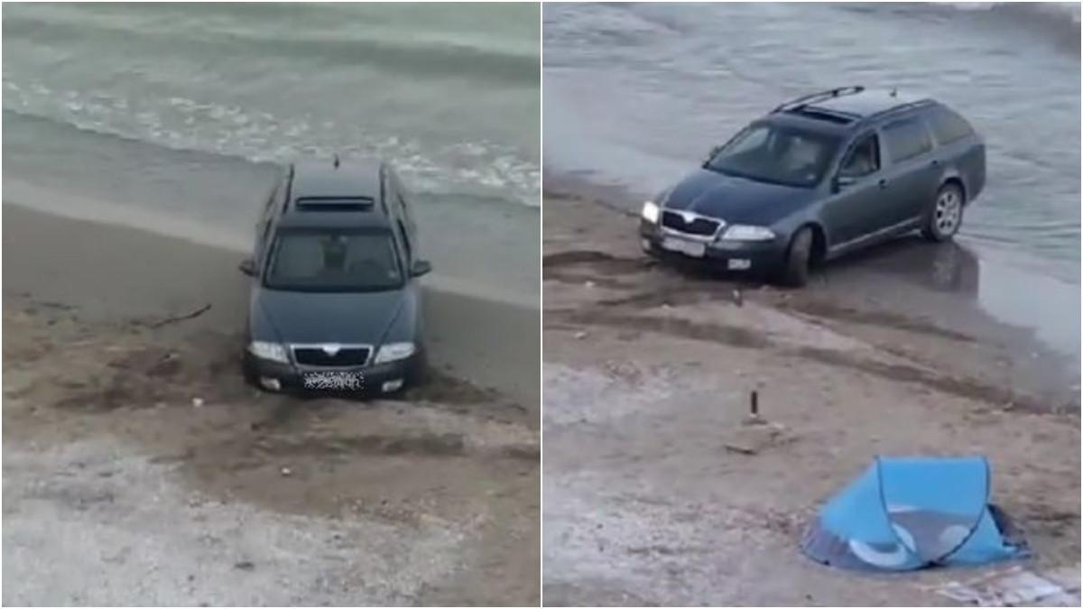 jupan de jupan un sofer a ramas blocat cu masina in nisipul plajei la constanta imaginile s au