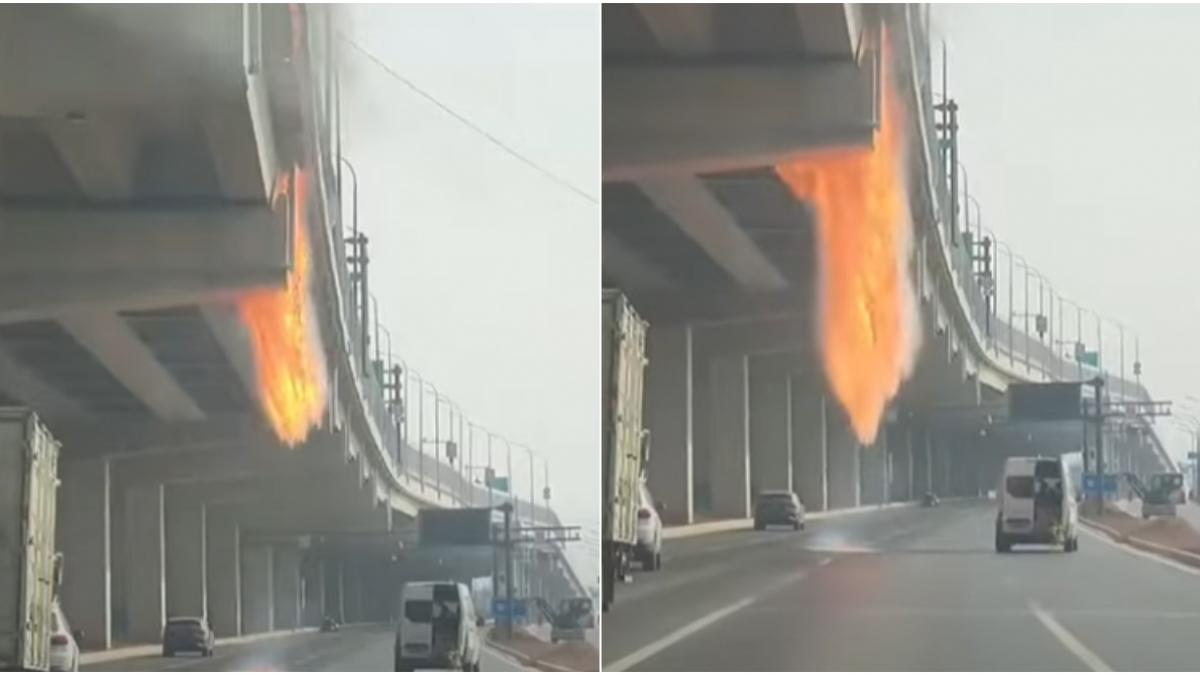 imagini virale cu o cascada de foc care se prabuseste de pe un pod in china dupa un accident rutier