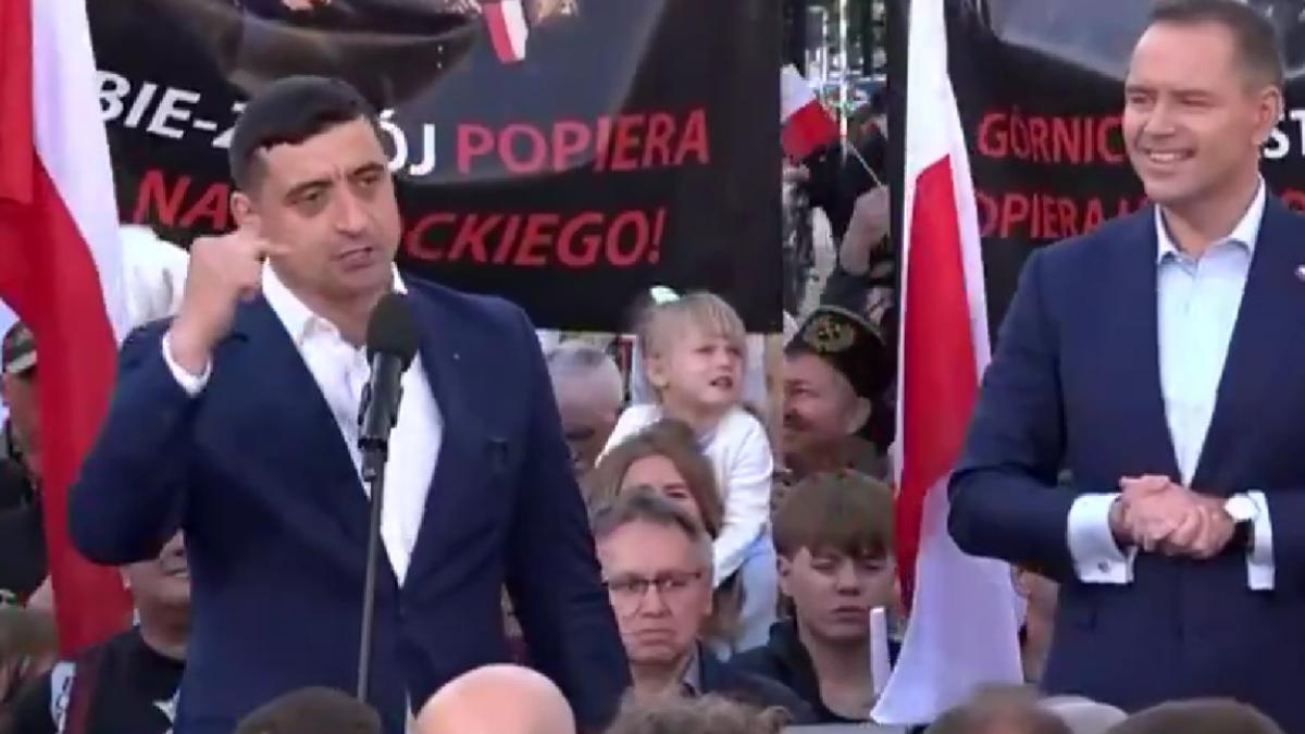 george simion s a dus in polonia sa se lupte cu neomarxistii si green deal a citit 10 minute de pe foi la mitingul lui karol nawrocki