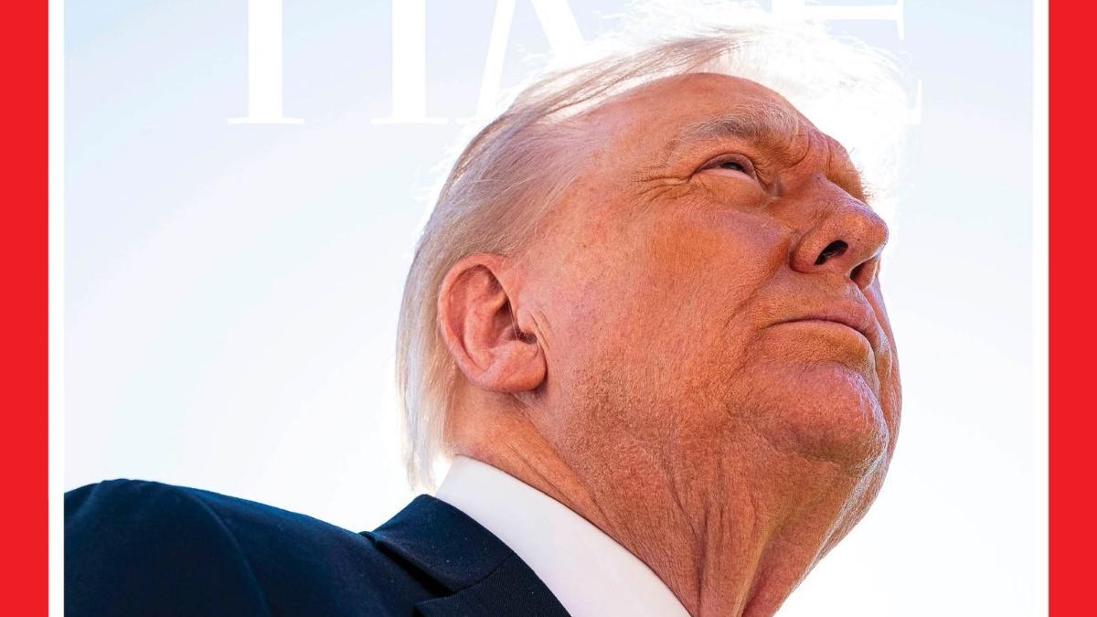 trump este nemultumit de poza lui de pe coperta time mi au sters parul e foarte rea pe cap pluteste ceva care arata ca o coroana