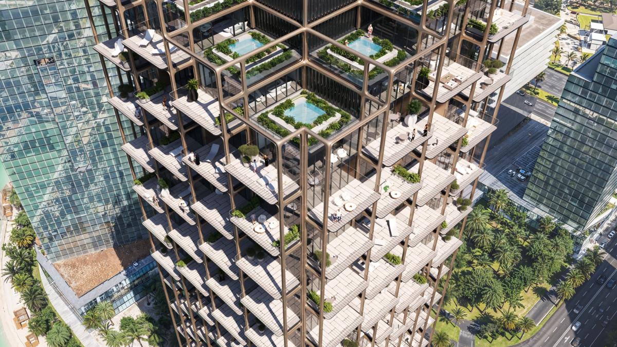 un zgarie nori intors pe dos cu structura de exoschelet si terase cu piscine se construieste in dubai cum va arata symphony tower