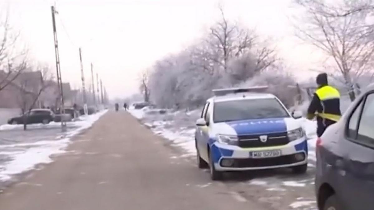 poza cu o masina a politiei de la o crima din Timis