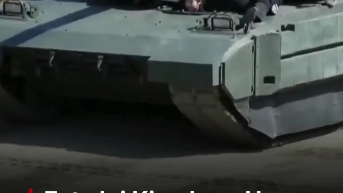 fata lui kim jong un a condus un tanc la un exercitiu militar