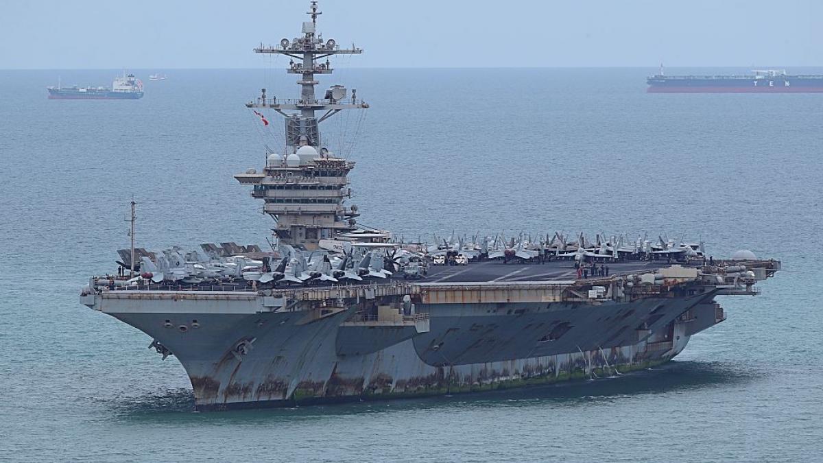 rugina depusa pe portavionul uss abraham lincoln dupa 286 de zile pe mare ii socheaza pe americani le va lua 30 de zile s o curete