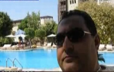 Boenică, interlop urmărit internaţional, se ascunde de poliţie la piscină