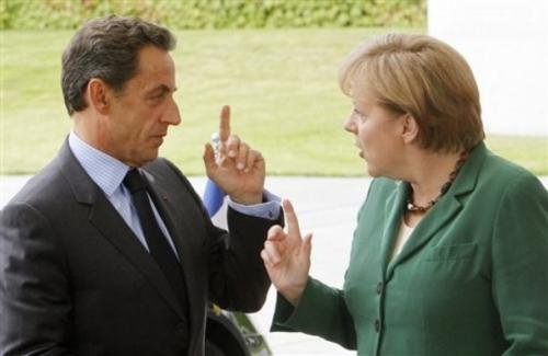 Zona euro, la un pas de infarct. Merkel şi Sarkozy, cu bisturiul în mână
