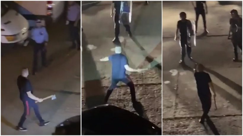 Polițiștii din Vaslui, amenințați cu două topoare de un bărbat pus pe scandal
